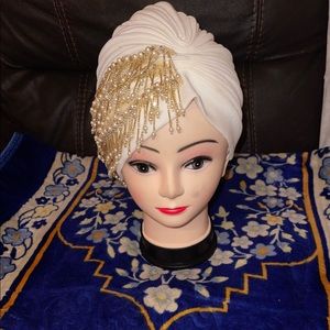 New- (Never worn) drip-beaded pre-styled head wrap; versatile styling